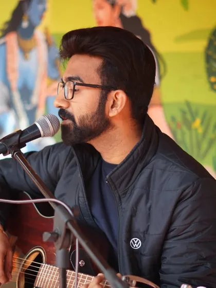 A candid moment captured during a live Bhajan Sandhya at Surabhi Gauseva Sadan. My focus is always on the music and the spiritual connection it fosters.