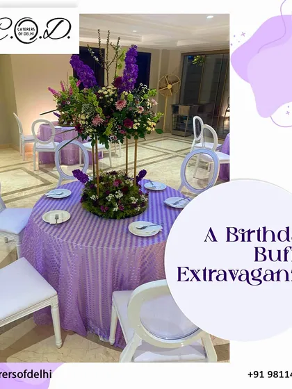 We specialize in creating birthday buffet extravaganzas that feel truly special. This image captures an elegant birthday dining setup with a beautiful floral centerpiece and coordinated lavender table linen, ready for a memorable celebration.
