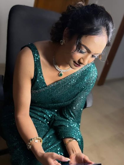 The complete look is glamorous and perfect for an evening event.