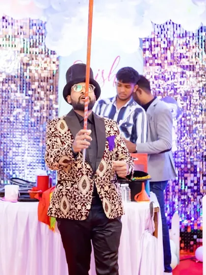 The appearing cane trick is a burst of visual surprise. A long cane appears instantly from my hand, a classic opener that immediately grabs the audience's attention.