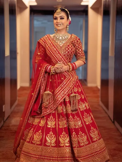 This bride's smile says it all. Her makeup is designed to be flawless and radiant, ensuring she looks and feels her best from every angle.