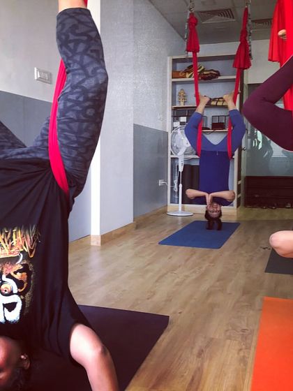 More fun from a private girls' weekend session. The laughter and smiles say it all. Contact me to book your own unique aerial yoga party.