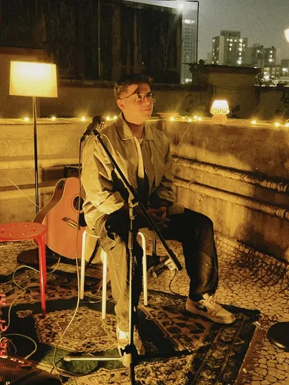 Sometimes, the best shows are the most intimate ones. Here I am, set up for a solo acoustic performance on a rooftop. This is perfect for private parties or cozy cafe gigs where the music can be front and center.