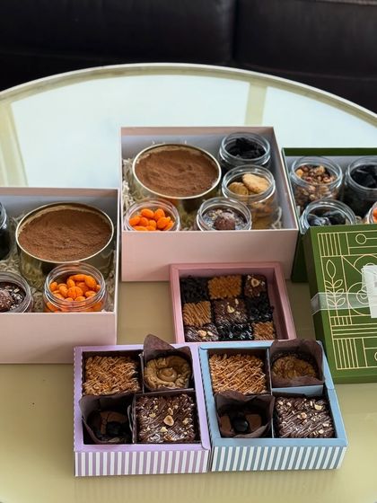 An assortment of our Rakhi hampers, from brownie boxes to our larger Tiramisu and granola combinations. There's something for every sibling.