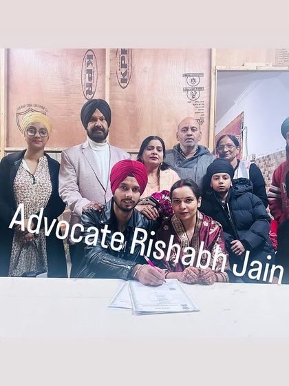 A beautiful family portrait taken right after the couple completed their court marriage registration. It's always a pleasure to see families come together to celebrate these new beginnings.