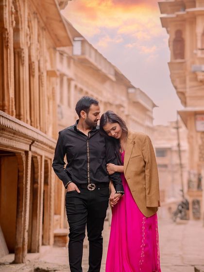 A romantic stroll through the narrow, historic lanes of Jaisalmer. The soft light and ancient architecture create a timeless atmosphere, perfect for capturing the quiet moments of your love story.