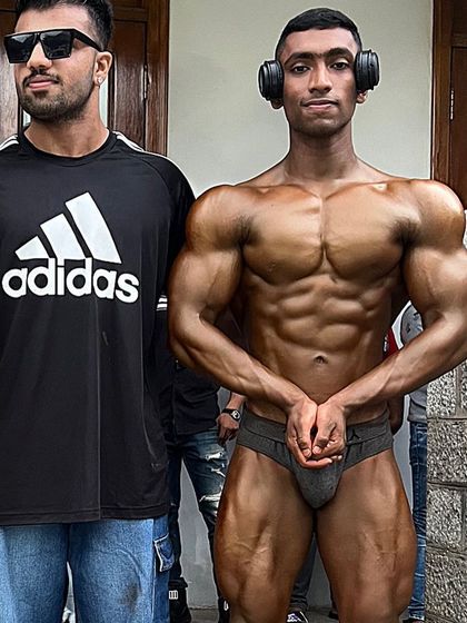 Standing with my 18-year-old client after his show. He has a huge future ahead of him in natural bodybuilding, and this was just the start.