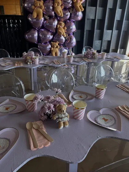 The full tablescape for Leila's teddy bear birthday, where heart-shaped plates and lavender details created a sweet and cohesive look.