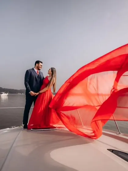 The infinity trail of our classic red gown in full flight. This shot shows how the lightweight fabric creates incredible shapes for those must-have dramatic pre-wedding photos.
