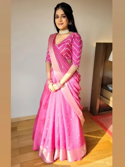 This modern lehenga drape is perfect for young women who want a fresh and stylish look for weddings or parties. It is comfortable, chic, and allows for easy movement.
