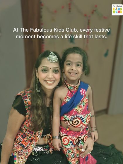 At our club, every festive moment becomes a life skill that lasts. A teacher and child share a happy moment during our Navratri event, showing the strong, supportive bonds we build here.