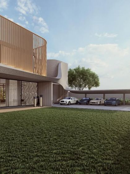 The backyard of the Celestia residence is designed with a vast, open lawn, perfect for family activities. The home's modern facade, with its curved lines and wooden louvers, provides a beautiful backdrop.