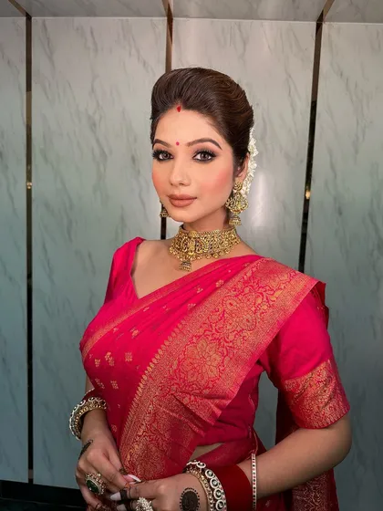 A portrait of the bride, her bindi and our temple choker completing her classic Indian look.