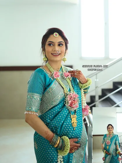 A lovely mom-to-be wearing a fresh floral set with delicate pink carnations. The jewellery is designed to be lightweight and comfortable while still looking beautiful.