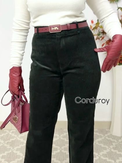 A close-up on winter accessories. Here, I've paired corduroy pants with a matching burgundy belt, bag, and gloves, showing how tonal accessories can create a cohesive and luxurious look.