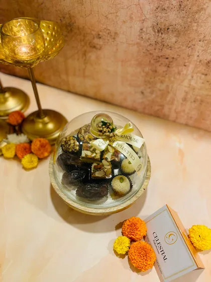 Our 'Magnificent Sweet Cloche' filled with an assortment of our healthy, soulful mithai. A beautiful and reusable festive gift.
