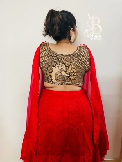 Another full view of the henna blouse design, highlighting the clean lines and detailed artwork that make it look like part of the outfit.
