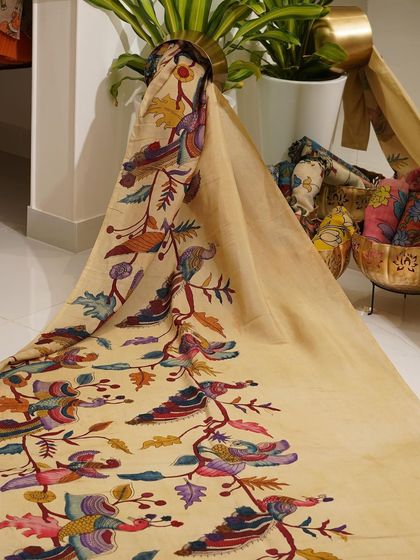 This is a glimpse into my Kalamkari Edition, featuring a wide array of hand-painted dupattas and fabrics from the Indralokam series. Each piece is a unique story, available for you to customize into your dream outfit.