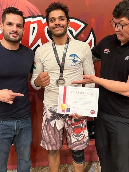 Receiving my Silver medal certificate at the ADCC India Submission Fighting Championship 2023. ADCC is the pinnacle of No-Gi grappling, and it was an honor to compete and make it to the podium.