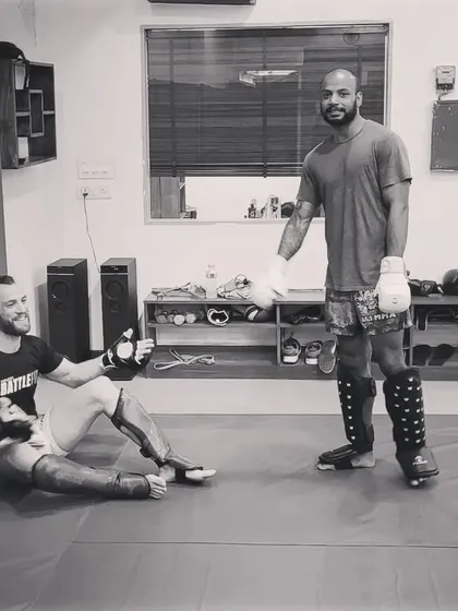 A moment of rest between the hard rounds. The camaraderie built through shared struggle is what makes our team so strong.