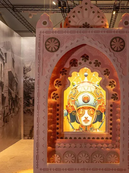 A backlit portrait from the 'Indofuturism' installation, framed by a felt archway designed to look like a typical Indian Mahal. The piece is a deliberate juxtaposition of the old and the new.