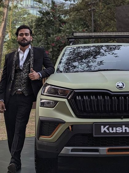 Standing next to the Skoda Kushaq at a corporate event. Automotive brands often use my live art to create an engaging and memorable experience for their launches.