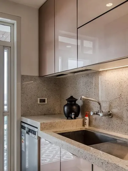 The sink and prep area of our JP Decks project, with a large window providing natural light and a beautiful view.