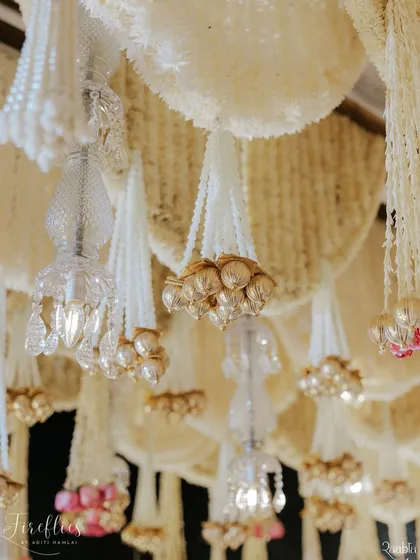 A close-up of the hanging floral tassels from the 'Ivory Clad Promises' wedding, made from mogra buds and accented with crystals.