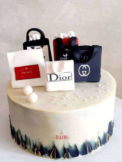 Another version of my popular shopping-themed cake. This one has a modern, brushed-on color effect at the base, giving it a different but equally chic style.