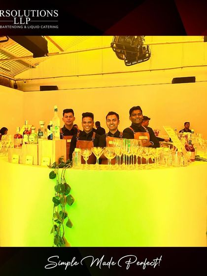 The stylish, circular bar setup for the Garnier launch, illuminated and ready for service.