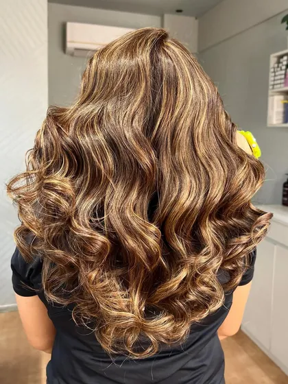 Another angle of the beige blonde, showing how the light catches the different tones in the hair.
