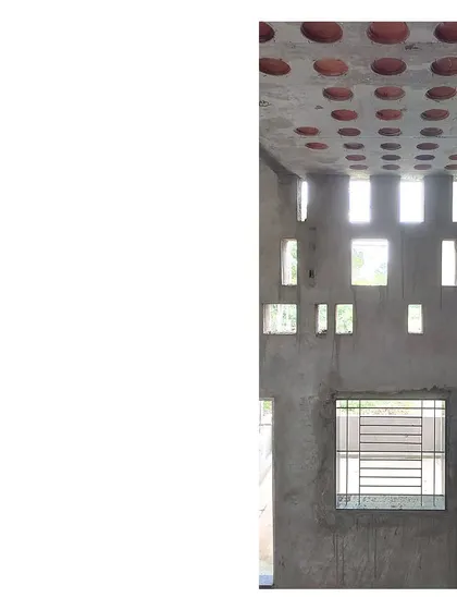 This is the 'Wall of Light' at the Mahesh Residence, seen here during construction. The angular punctures are designed to create a dynamic play of light inside. This image shows the raw form of a feature that will become a defining element of the home's atmosphere.