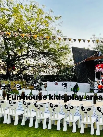 A whimsical outdoor party with a panda theme. We decorated our classic white chairs with adorable panda faces, demonstrating how we can customize our furniture rentals to match any creative party idea.