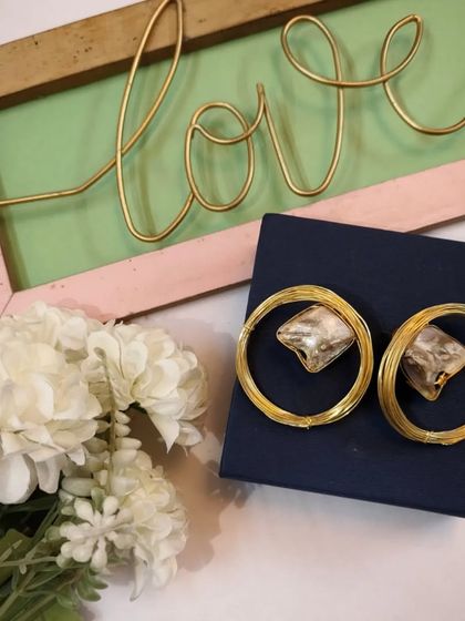 Another lovely shot of the beautiful golden brass hoop earrings, ready to be gifted.