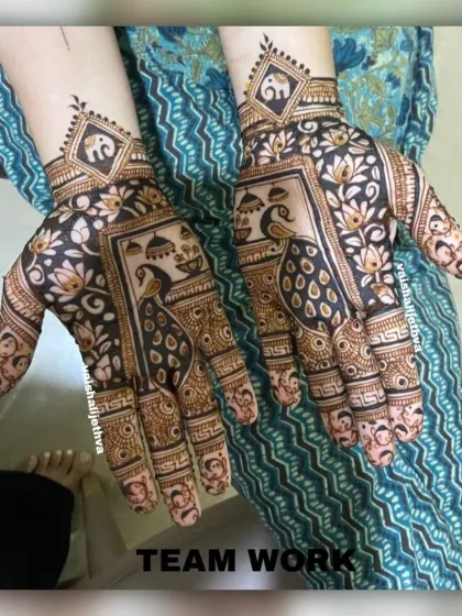 My team created this beautiful design featuring bold peacock and lotus motifs. The use of negative space makes the figures stand out beautifully.