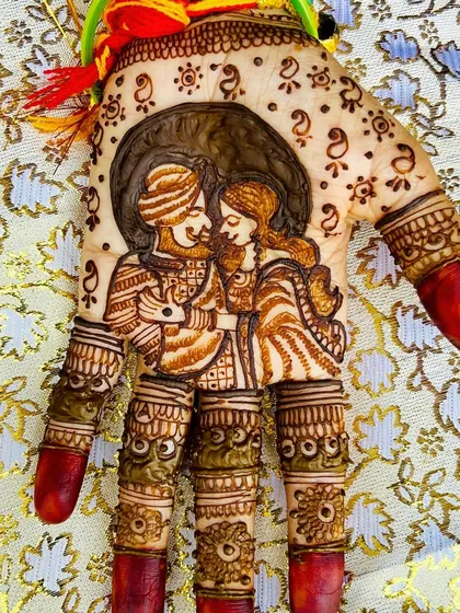 A close up of a custom couple portrait, capturing a special moment for the bride. I love working with you to bring these personal stories to life in your engagement or wedding henna.