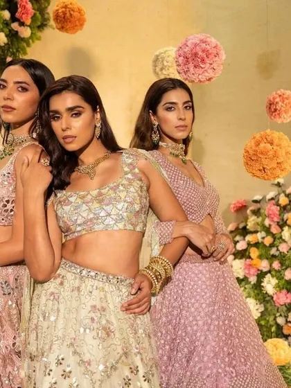 A powerful group pose, showcasing the confidence and elegance of the styled looks.