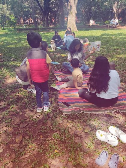 A series of photos from our 'Storyscapes 16' session, capturing the authentic, unposed moments of our circle. You can see children listening, playing, and interacting naturally, which is the essence of our child-led storytelling approach.