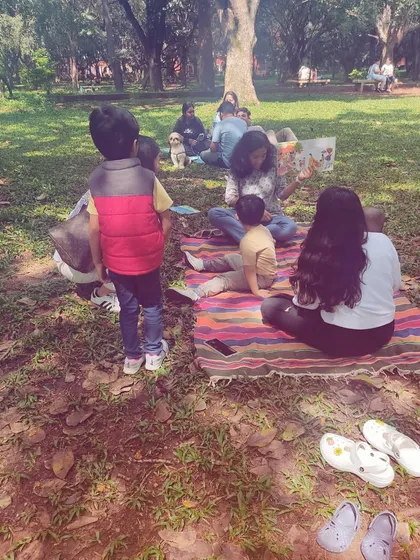 A series of photos from our 'Storyscapes 16' session, capturing the authentic, unposed moments of our circle. You can see children listening, playing, and interacting naturally, which is the essence of our child-led storytelling approach.