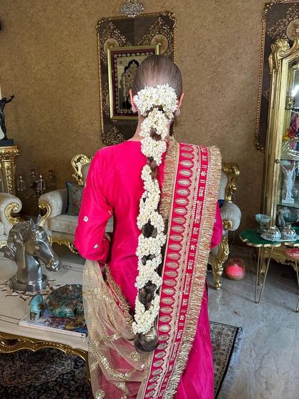 A classic, long braid fully adorned with fragrant mogra flowers. This is a timeless and traditional look that I love creating and teaching.