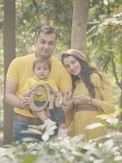 An outdoor family photoshoot celebrating a first birthday and a new baby on the way. We love capturing these milestones for growing families in natural, beautiful settings.