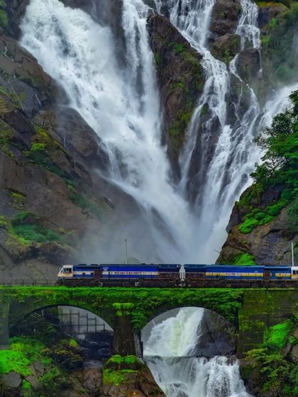 Another perspective of the train crossing the Dudhsagar bridge, highlighting the perfect blend of engineering and nature.