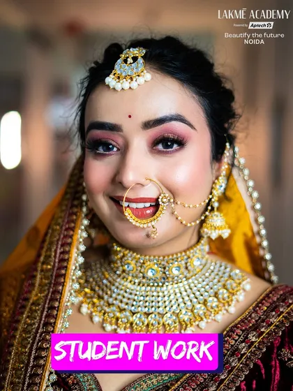 A bright and happy bridal portrait. This student-created look features a classic nath and a beaming smile, capturing the essence of a joyful Indian wedding.