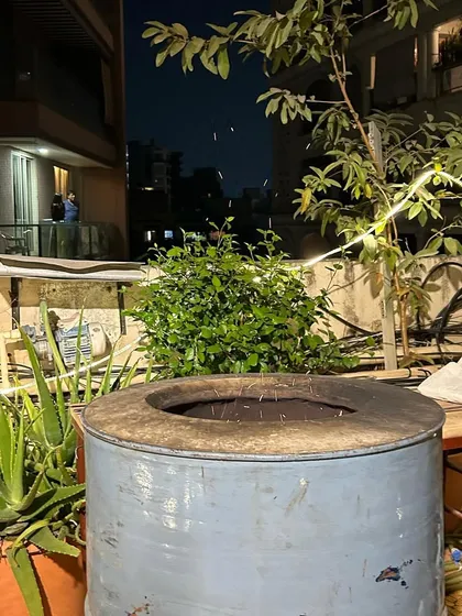 The tandoor is fired up and ready for a terrace party under the stars. The ambiance of a live flame adds a special warmth and excitement to any outdoor event.