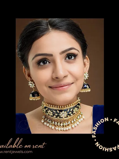 This Jadau Kundan choker with deep blue Meena work is a striking choice for a reception or Sangeet. It pairs beautifully with blue or silver outfits.