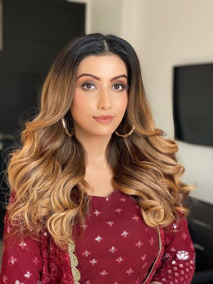 Open out-curls taught in my online class. This technique creates a beautiful, windswept look that is very flattering.