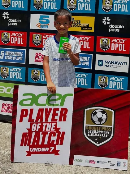Celebrating our youngest stars. A U7 player recognized as Player of the Match at the DPDL.