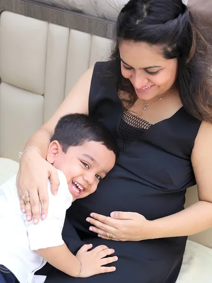 The excitement of a big brother waiting to meet his new sibling is palpable. Capturing this bond during a maternity session is one of my favorite things to do.