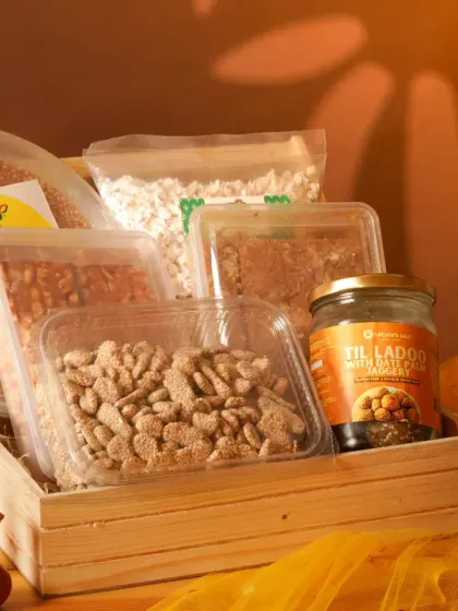 A festive hamper filled with healthy Lohri snacks. This image is perfect for promoting seasonal gift options.