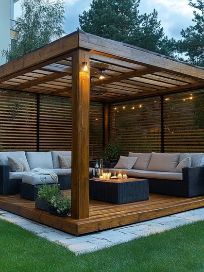 We constructed this robust wooden pergola to create a spacious and inviting outdoor living room. The slatted side panels offer privacy while the open roof design allows for airflow, making it a comfortable extension of the home.